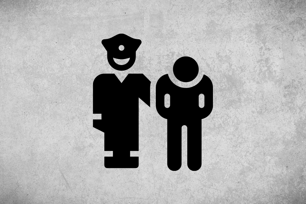 Police officer arresting a person