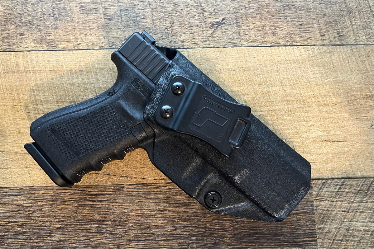 Glock 19 inside a Tulster Holster on a table