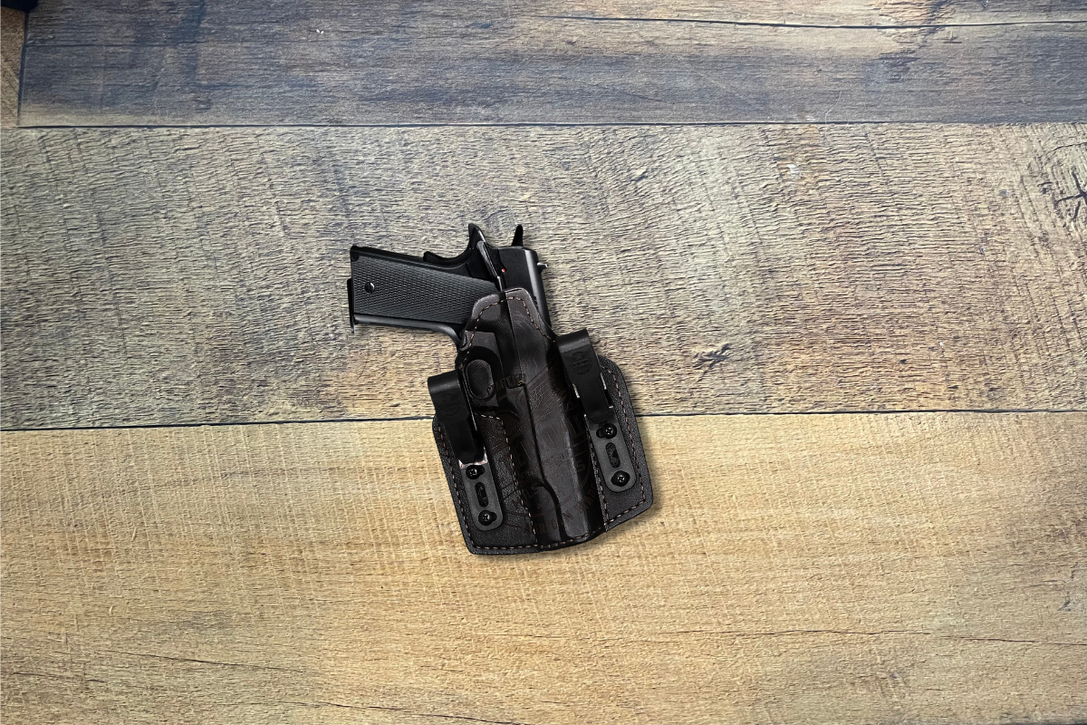 .45 in leather holster on work bench